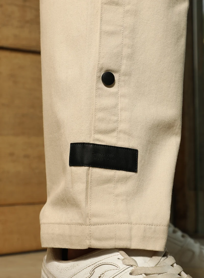 Campus Sutra  Men's Off-White Side-Snap Straight Trousers For Casual Wear | Mid-Rise | Straight Fit | Button Closure | Trousers Crafted With Comfort Fit For Everyday Wear for Men | Best Price UAE